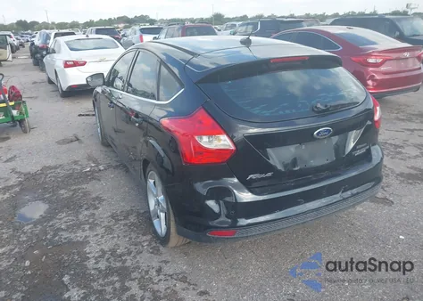 2014 Ford Focus Titanium из США, поврежденный, VIN 1FADP3N28EL208034